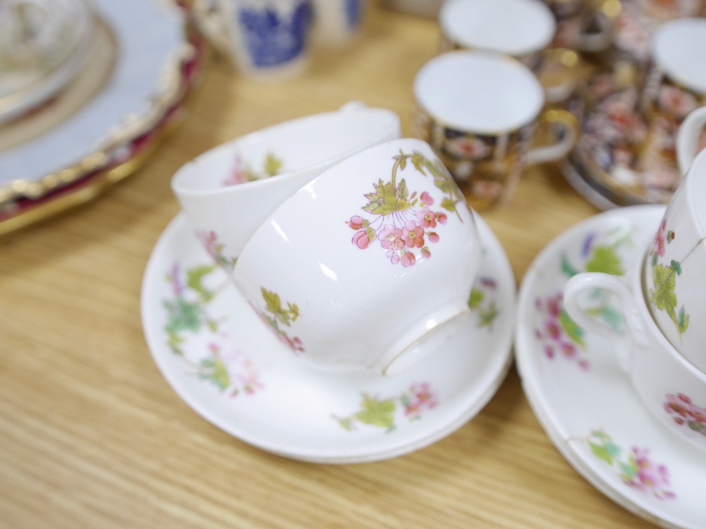 An English part teaset, c.1825 and six Royal Crown Derby coffee cans and saucers etc. Condition - some items cracked chipped and losses to gilding, teapot cover finial broken